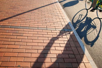 Bicycle leaning, Very shallow depth of field shot against the sun, minimal chromatic aberrations