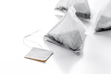 Triangle teabags on white background mockup