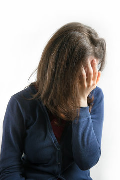 embarrassed woman shame concept, vertical picture of lady covering her face