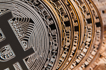 Golden bitcoin on keyboard