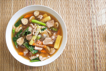 Fried wide rice noodle with pork and gravy sauce. Asian food. Healthy and tasty menu. Top view.