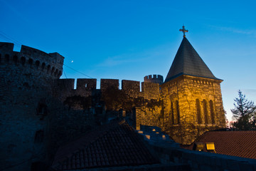 Church tower inside Kalemegdan fortress walls at blue hour in Belgrade, Serbia
