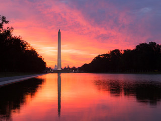 Fototapeta na wymiar Brilliant sunrise over reflecting pool DC