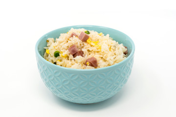 Homemade Chinese fried rice with vegetables and fried eggs