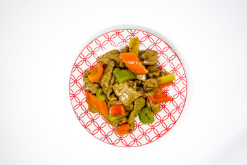 wok fried chicken stir fry with sweet peppers and chinese vegetables