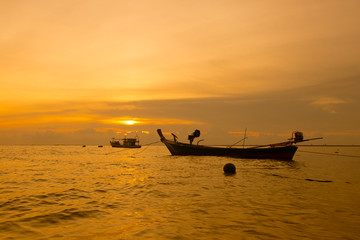 Obraz premium people on the beach during sunset time or silhouette