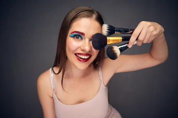 Crazy make up artist with clown worst make up.