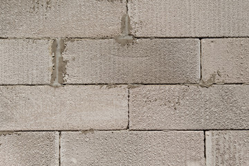 Background of the white brick wall with horizontal masonry