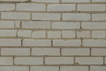 Background of the white brick wall with horizontal masonry