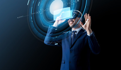 businessman in virtual reality headset over black