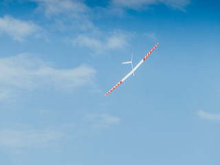 RC soaring plane on blue sky