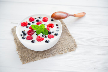 tasty yoghurt with raspberry