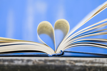 Open book on a wooden table