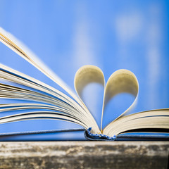 Open book on a wooden table