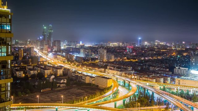 Time lapse of the busy interchange traffic at night in city