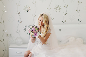 Morning of the young beautiful blonde. The fair-haired bride gathers for a wedding