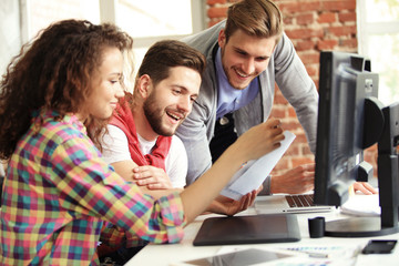 Startup Diversity Teamwork Brainstorming Meeting Concept.Business Team Coworkers Sharing World Economy Report Document Laptop.People Working Planning Start Up.Group Young Hipsters Discussing Cafe.