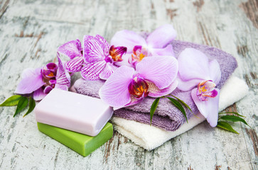 Naklejka na ściany i meble Handmade soap and purple orchids