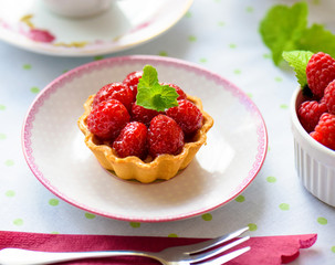 Mini tart with raspberries fruits