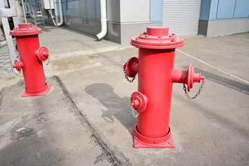 Fototapeta na wymiar Red fire hydrant, fire safety system.
