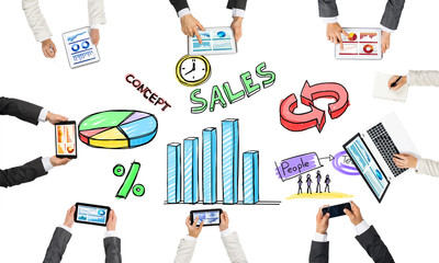 Top view of businesspeople sitting at table and using gadgets