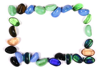 frame colorful glass stone isolated on white background, top view