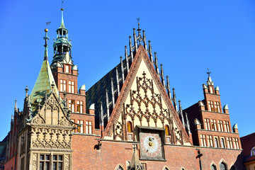 Colorful morning scene on Wroclaw Market Square with Town Hall. Sunny cityscape in historical capital of Silesia, Poland, Europe.