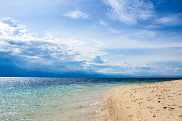 Obraz premium Natural landscape with sea and clouds. Tropical island lagoon in sunny day.