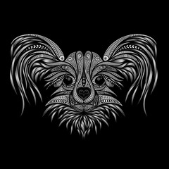 Silhouette of a vector dog from abstract patterns on a black background