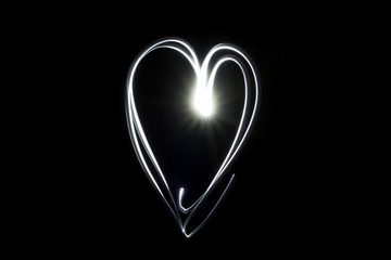 Cuore di luce immerso che risplende nel buio. Perche c'è sempre chi ci ama anche nei momenti più...