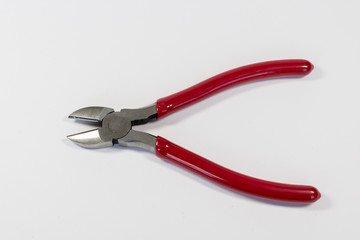 Wire cutters with red handle