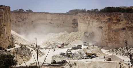 Panoramic view of the limestone quarry of Malta. A tilt-shift effect image. Environmental...