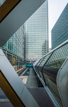 London, England - Public crossrail footbridge and the skyscrapers of the financial district of Canary Wharf