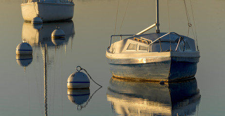 sailboats at sunrise - 164325264