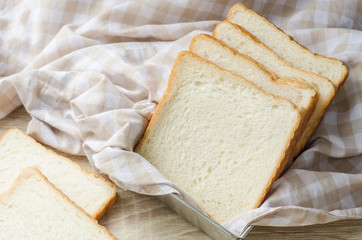 White bread on wood table for morning breakfast