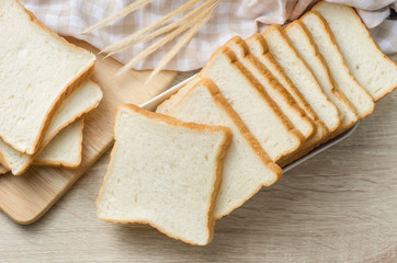 White bread on wood table for morning breakfast