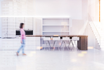 White kitchen interior, bar stand, woman