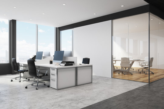 White and black open space office corner