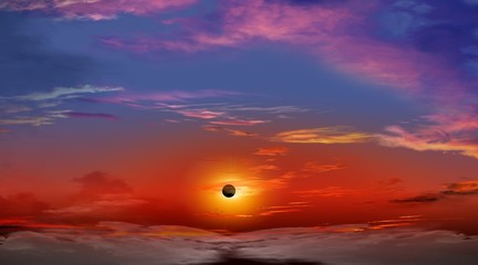 Total Solar Eclipse . Solar eclipse and colourful sky . Dramatic nature background . l