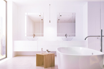 Fototapeta na wymiar White bathroom, tub, double sink toned