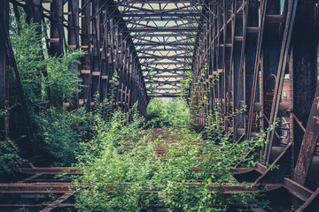 abandoned steel bridge - rusted steel beam construction