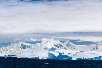 Icebergs, glaciers and mountains along the Antarctic Peninsula.