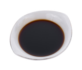 Bowl with soy sauce isolated on white background