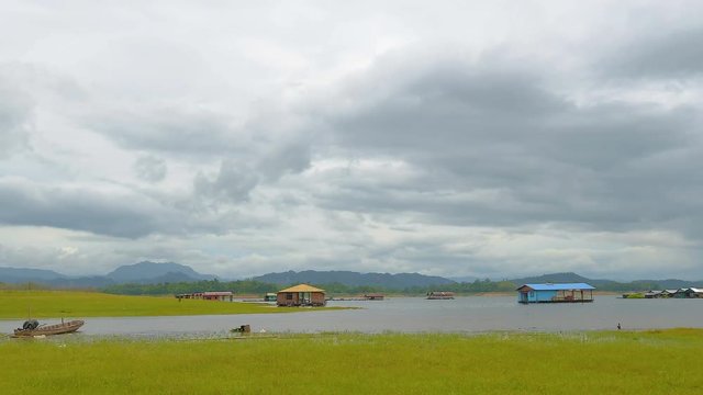 Floating houses floating in the lake with overcast weather. 