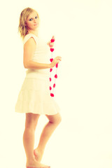 Girl with little red hearts.