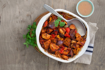 Baked chicken breast with vegetables and sauce