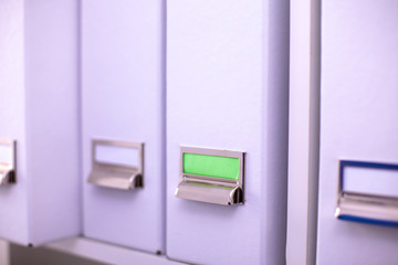 folders with documentation with binders in background