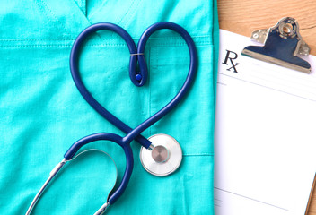 Stethoscope on a background of medical coat