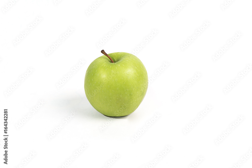 Wall mural green apple on white background