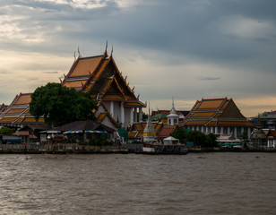 Fototapeta premium Wat Kalayanamitr buddhism Temple next to Chao Phraya River in Bangkok, Thailand.